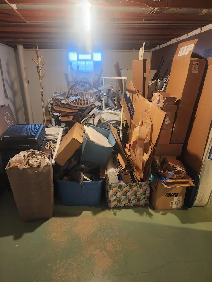 Roll-off dumpster container at job site for Yard Waste Dumpster Rental in Coopertown